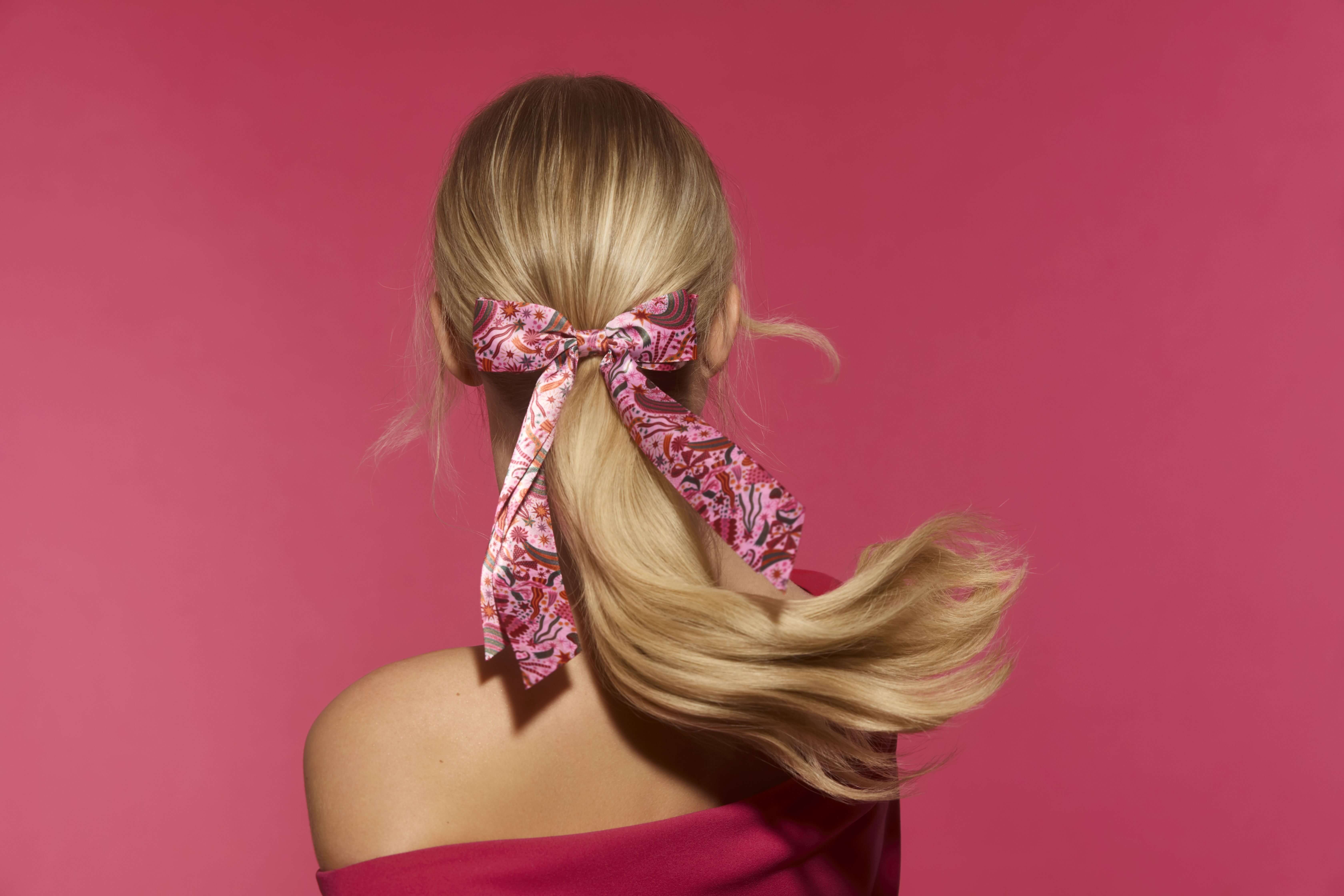 Party hairstyle with festive bow